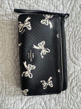 Coach Black Wristlet with White Bow Print